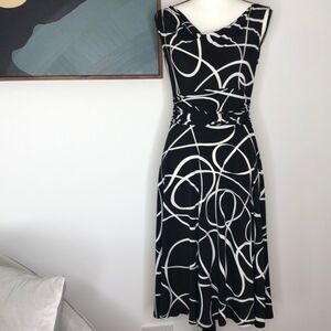 Maggie London black and white aligned dress, size 8